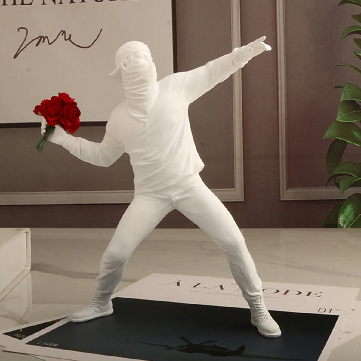 Banksy Flower Rioter Sculpture
